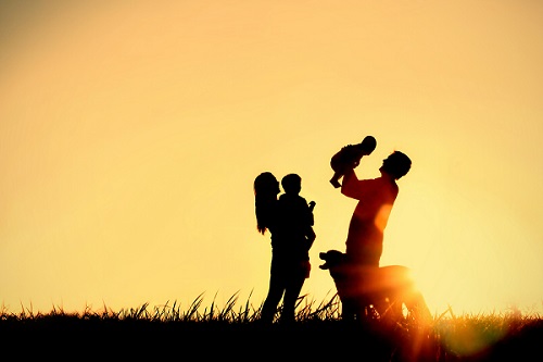 Happy family with their dog